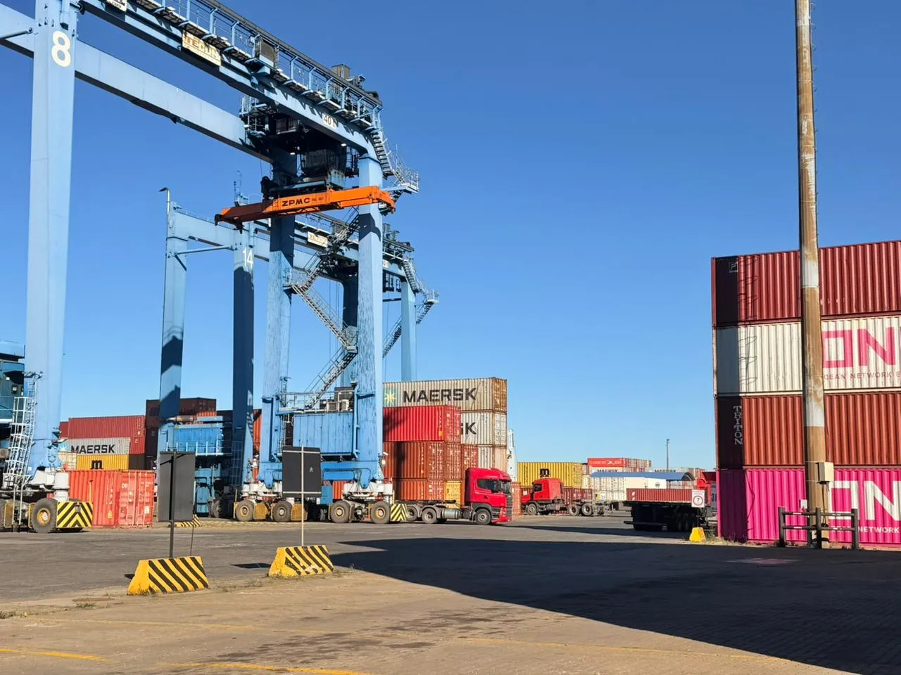 Trucks and cranes at the terminal